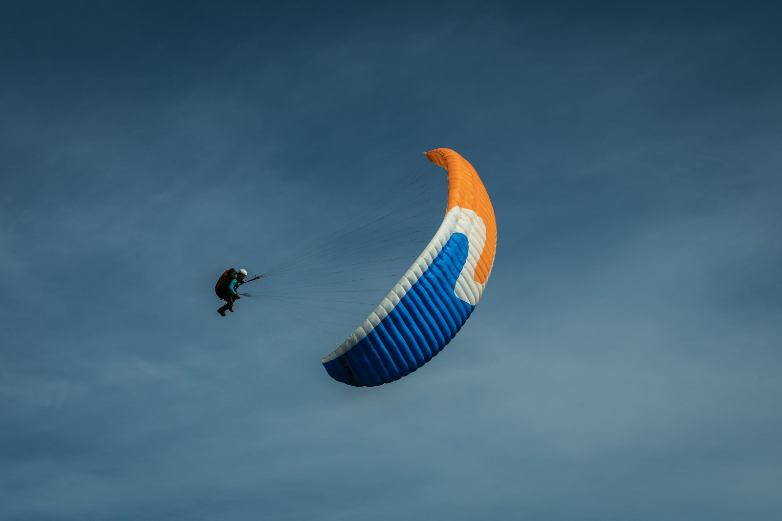 person doing paragliding